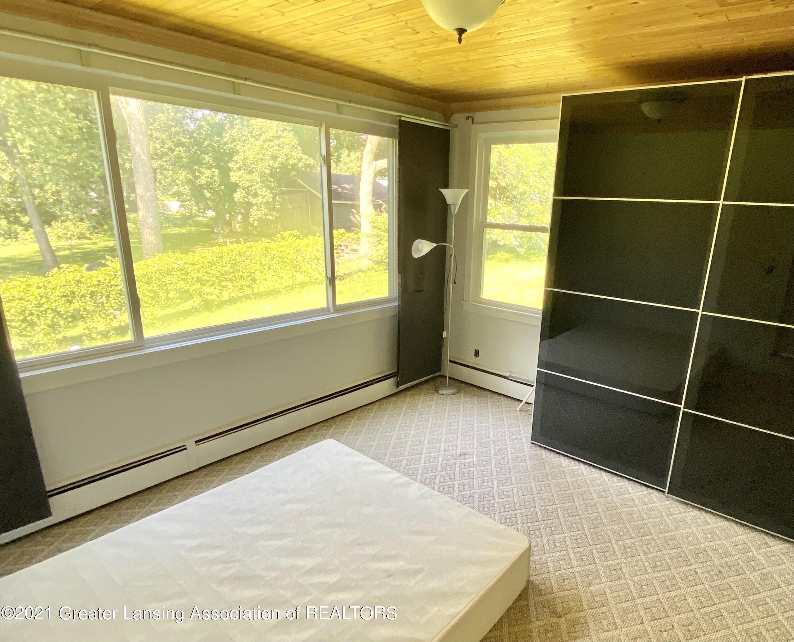 16074 Brook Road Lansing, MI 48906 - Photo 18 of 40 Master bedroom
