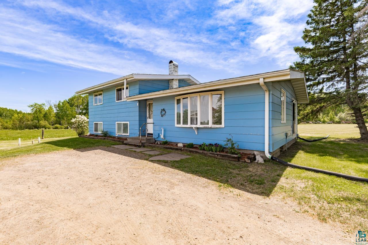 6606 Metso Road Kettle River, MN 55757 - Photo 50 of 84 Blue exterior with white trim