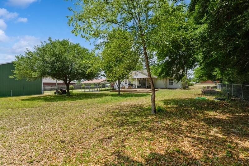 2377 Lake Silver Road Crestview, FL 32536 - Photo 17 of 36 a house view with swimming pool