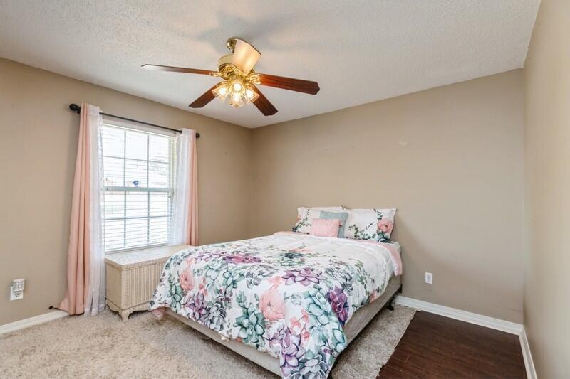 2377 Lake Silver Road Crestview, FL 32536 - Photo 28 of 36 a bedroom with a large bed and a window