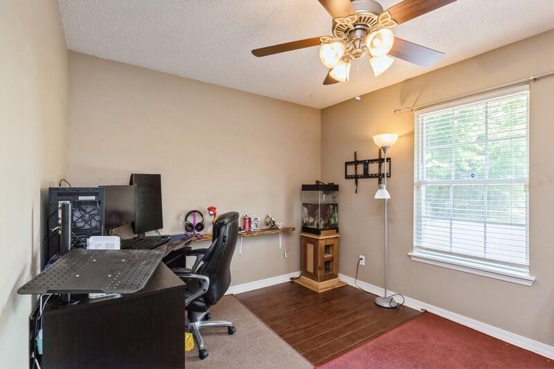 2377 Lake Silver Road Crestview, FL 32536 - Photo 30 of 36 a view of a workspace with furniture and a window
