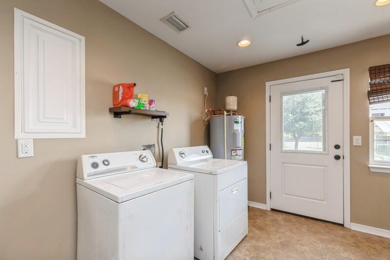 2377 Lake Silver Road Crestview, FL 32536 - Photo 36 of 36 a utility room with dryer washer and a window
