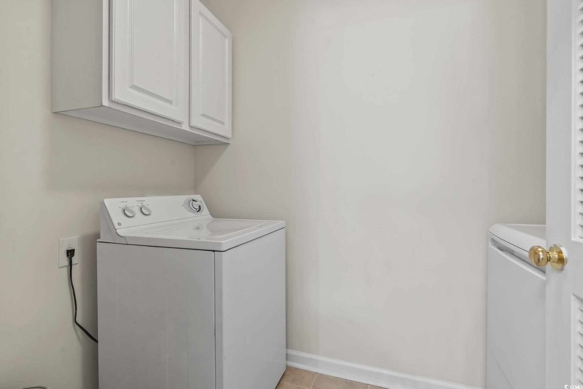 5810 Longwood Drive, Unit 14304 Murrells Inlet, SC 29576 - Photo 15 of 30 Laundry room featuring cabinet space, independent