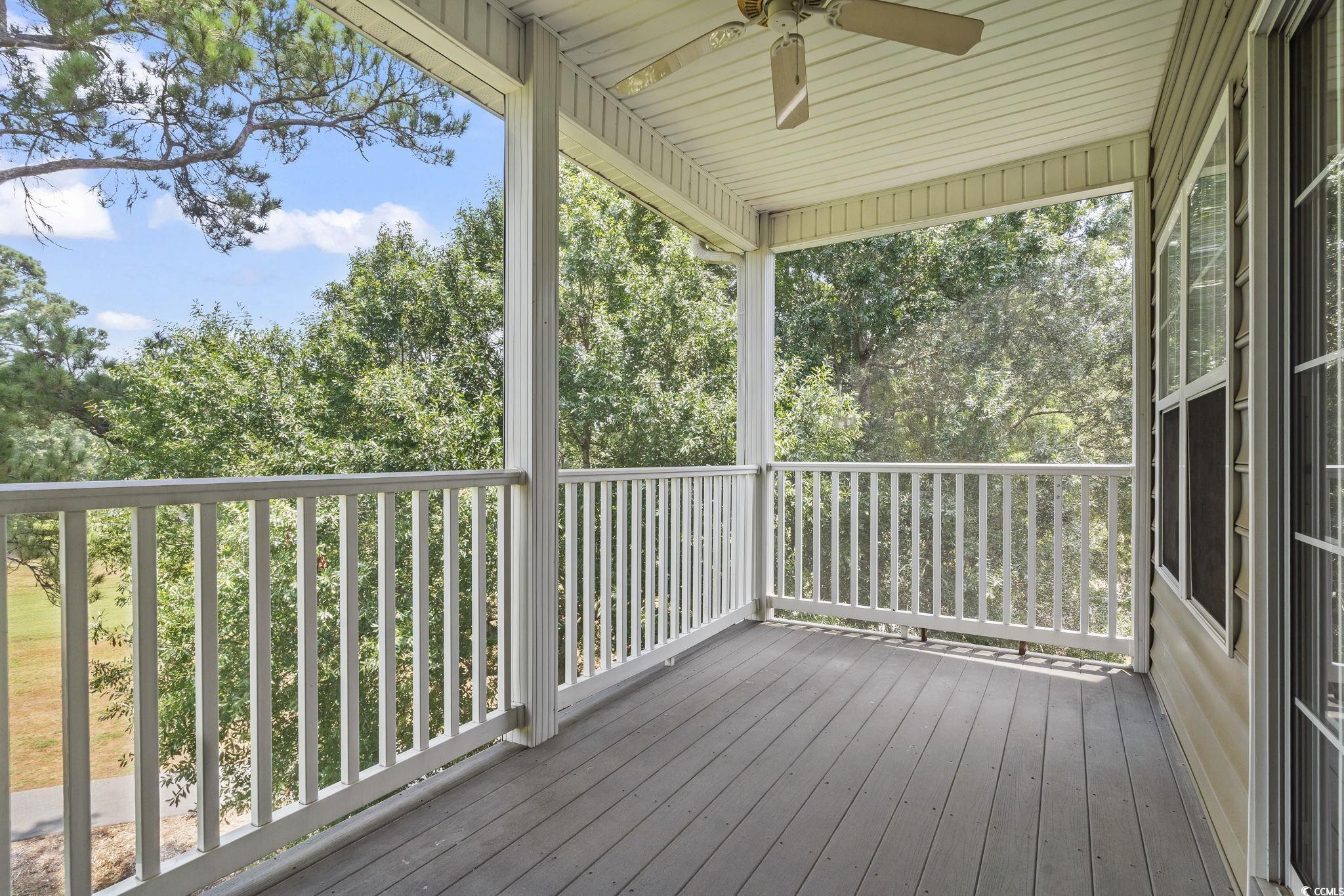 5810 Longwood Drive, Unit 14304 Murrells Inlet, SC 29576 - Photo 24 of 30 Wooden terrace featuring ceiling fan