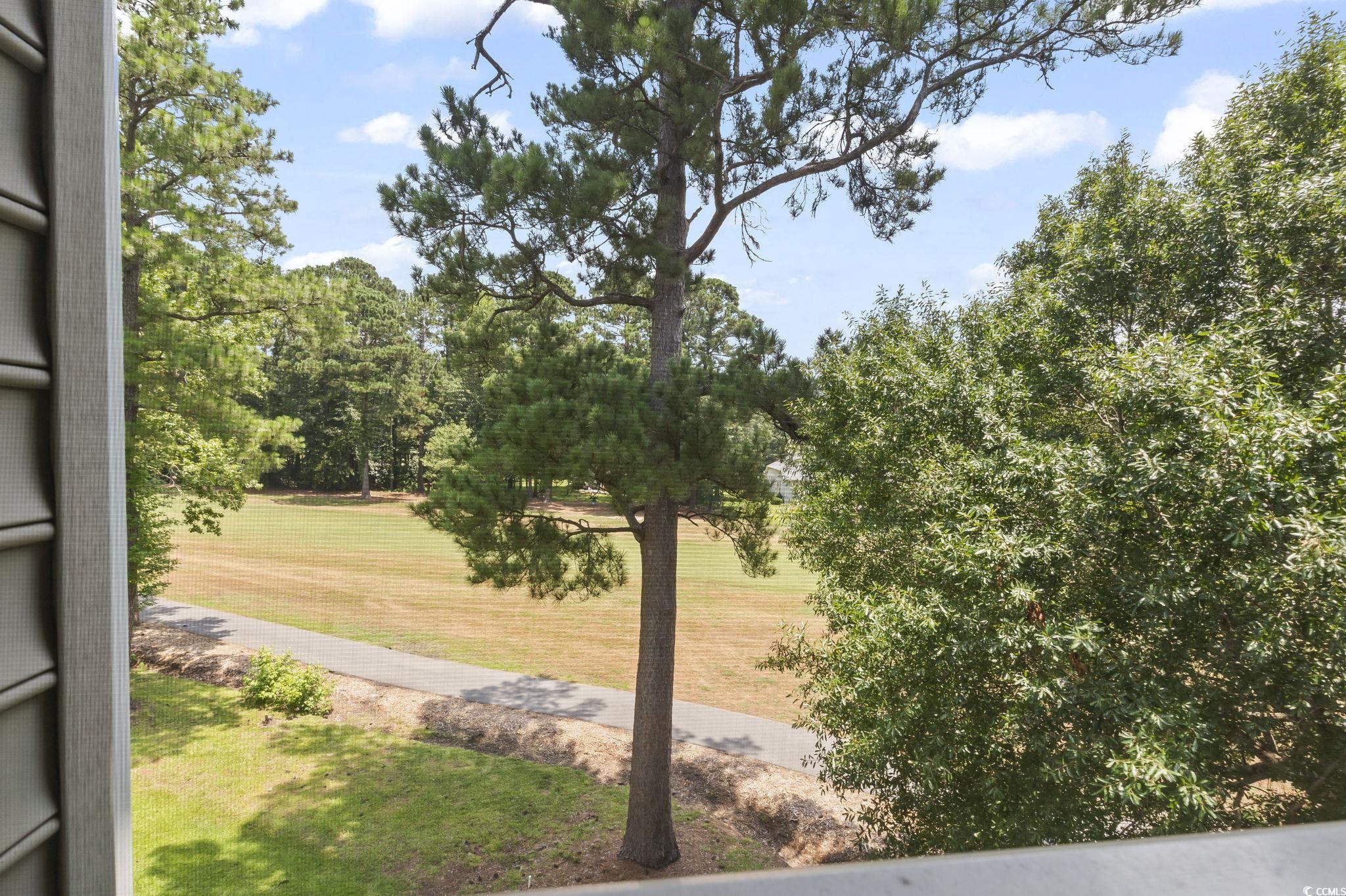 5810 Longwood Drive, Unit 14304 Murrells Inlet, SC 29576 - Photo 27 of 30 View of green lawn