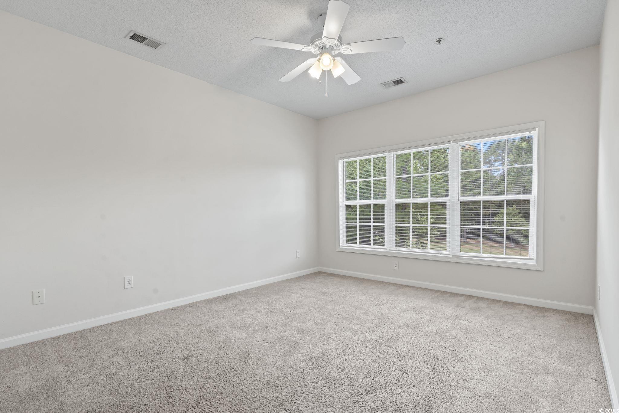 5810 Longwood Drive, Unit 14304 Murrells Inlet, SC 29576 - Photo 9 of 30 Unfurnished room featuring carpet flooring, ceilin