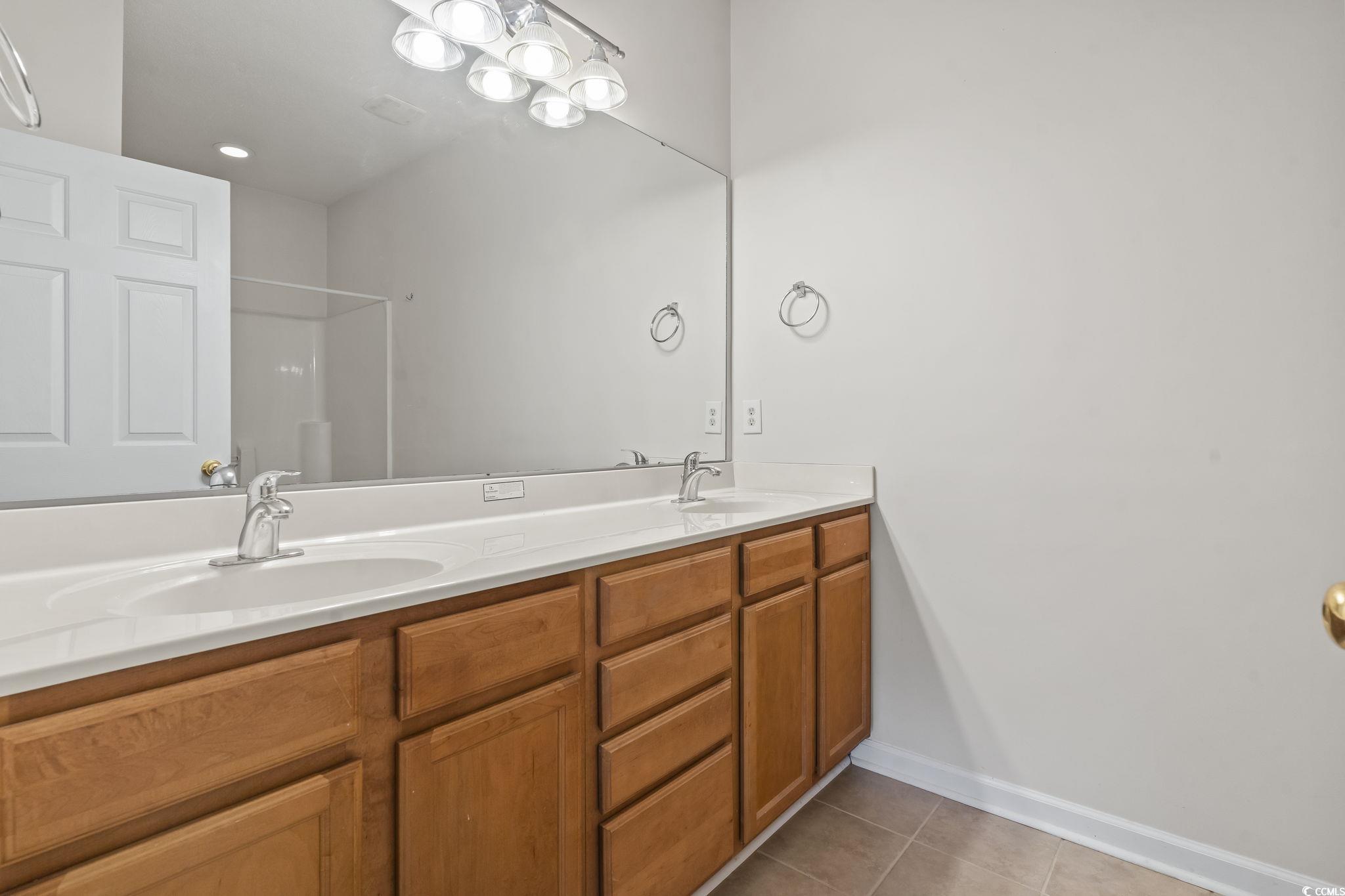 5810 Longwood Drive, Unit 14304 Murrells Inlet, SC 29576 - Photo 10 of 30 Full bath featuring double vanity, tile patterned