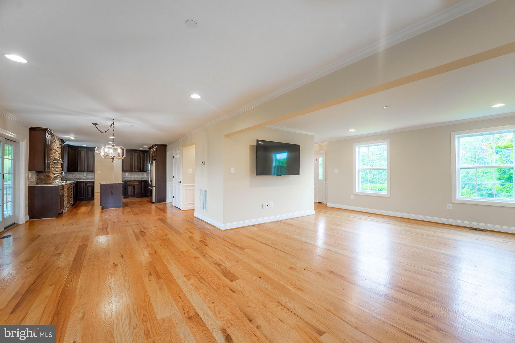 4905 Bartholows Road Mount Airy, MD 21771 - Photo 13 of 70 a view of a kitchen with a sink and a stove top oven