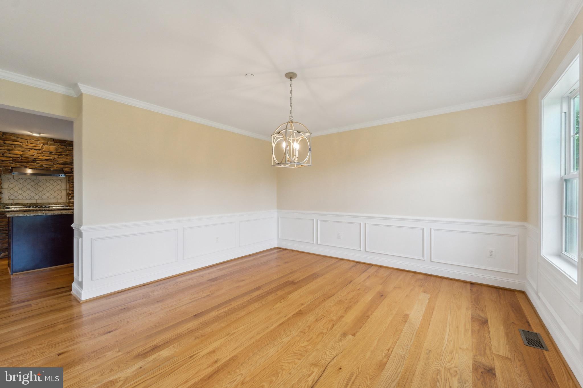 4905 Bartholows Road Mount Airy, MD 21771 - Photo 18 of 70 wooden floor in an empty room with a window