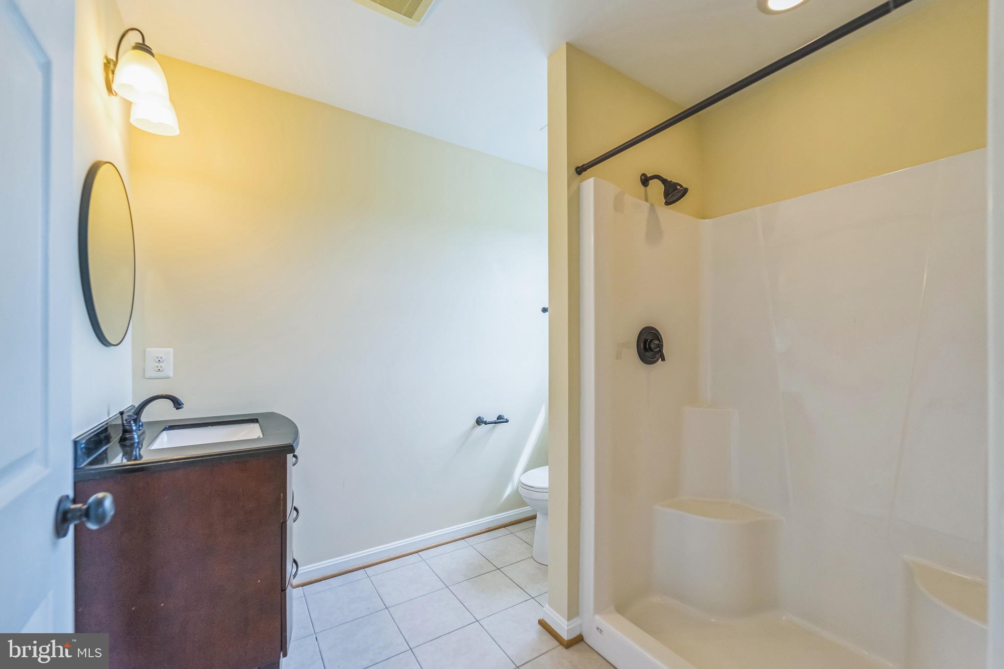 4905 Bartholows Road Mount Airy, MD 21771 - Photo 27 of 70 a bathroom with a shower