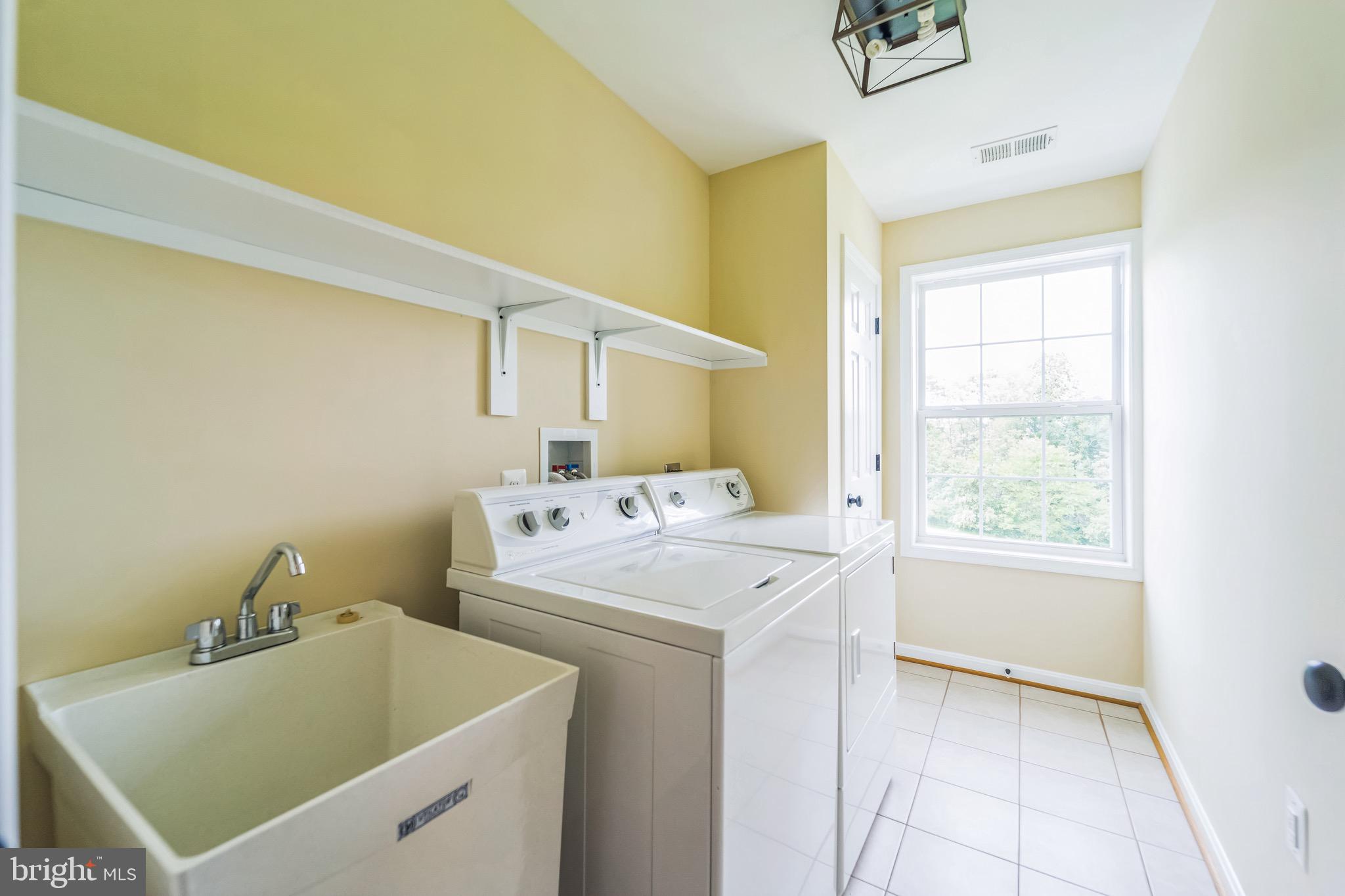 4905 Bartholows Road Mount Airy, MD 21771 - Photo 34 of 70 a utility room with dryer and washer