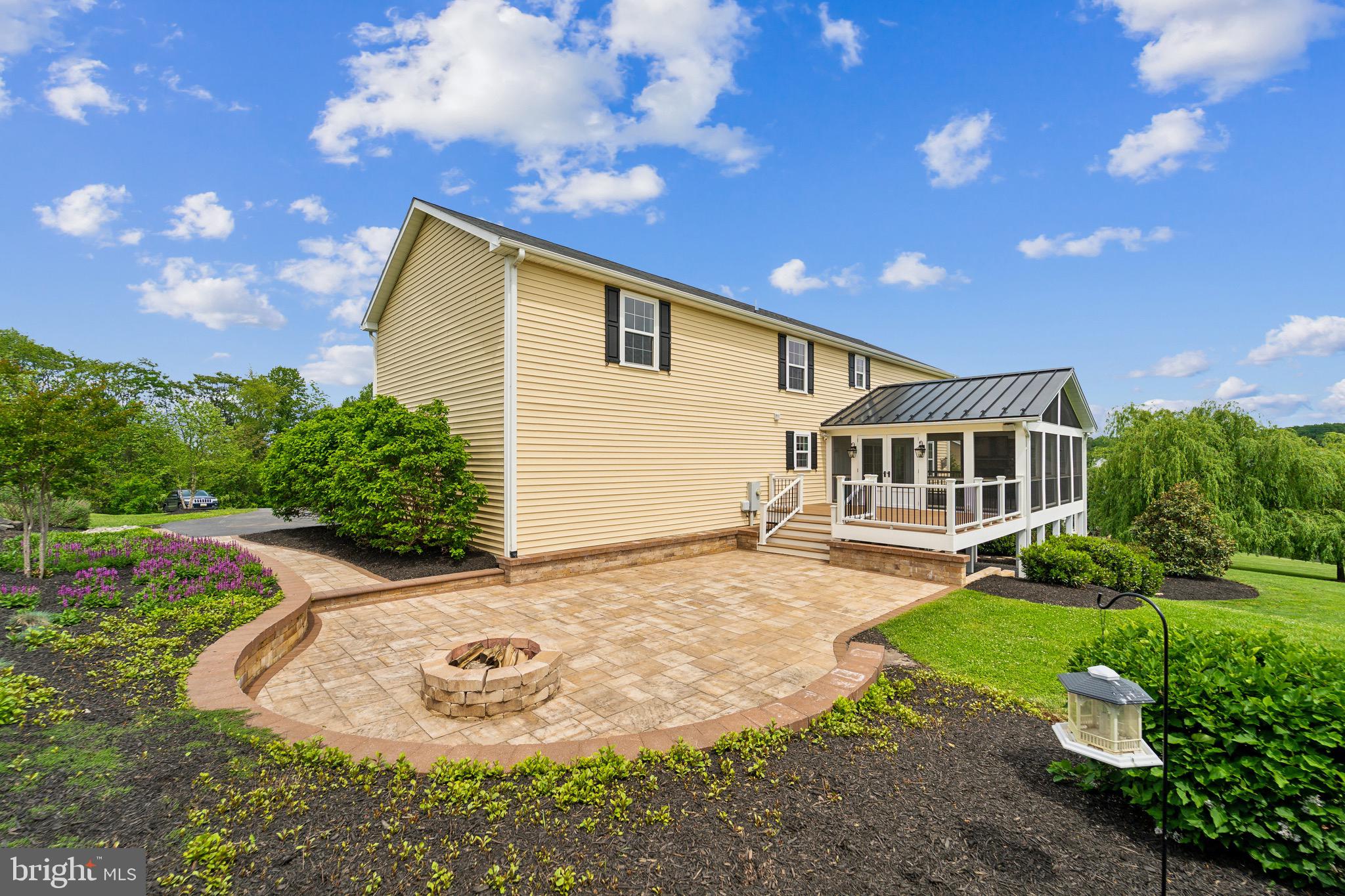 4905 Bartholows Road Mount Airy, MD 21771 - Photo 53 of 70 a view of a house with backyard and sitting area