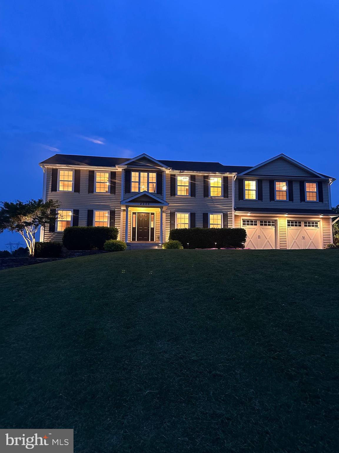 4905 Bartholows Road Mount Airy, MD 21771 - Photo 60 of 70 a front view of a house with a yard
