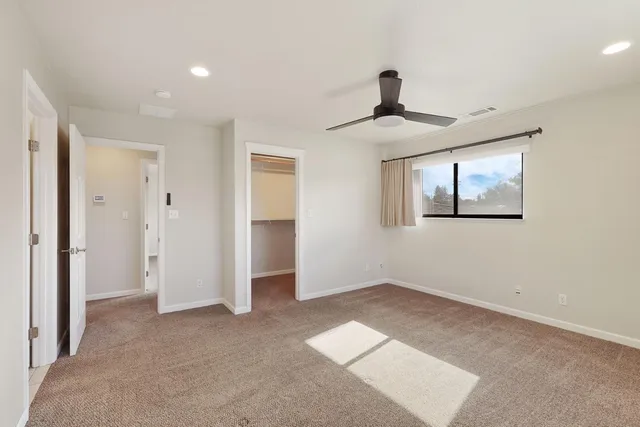 a view of empty room with windows