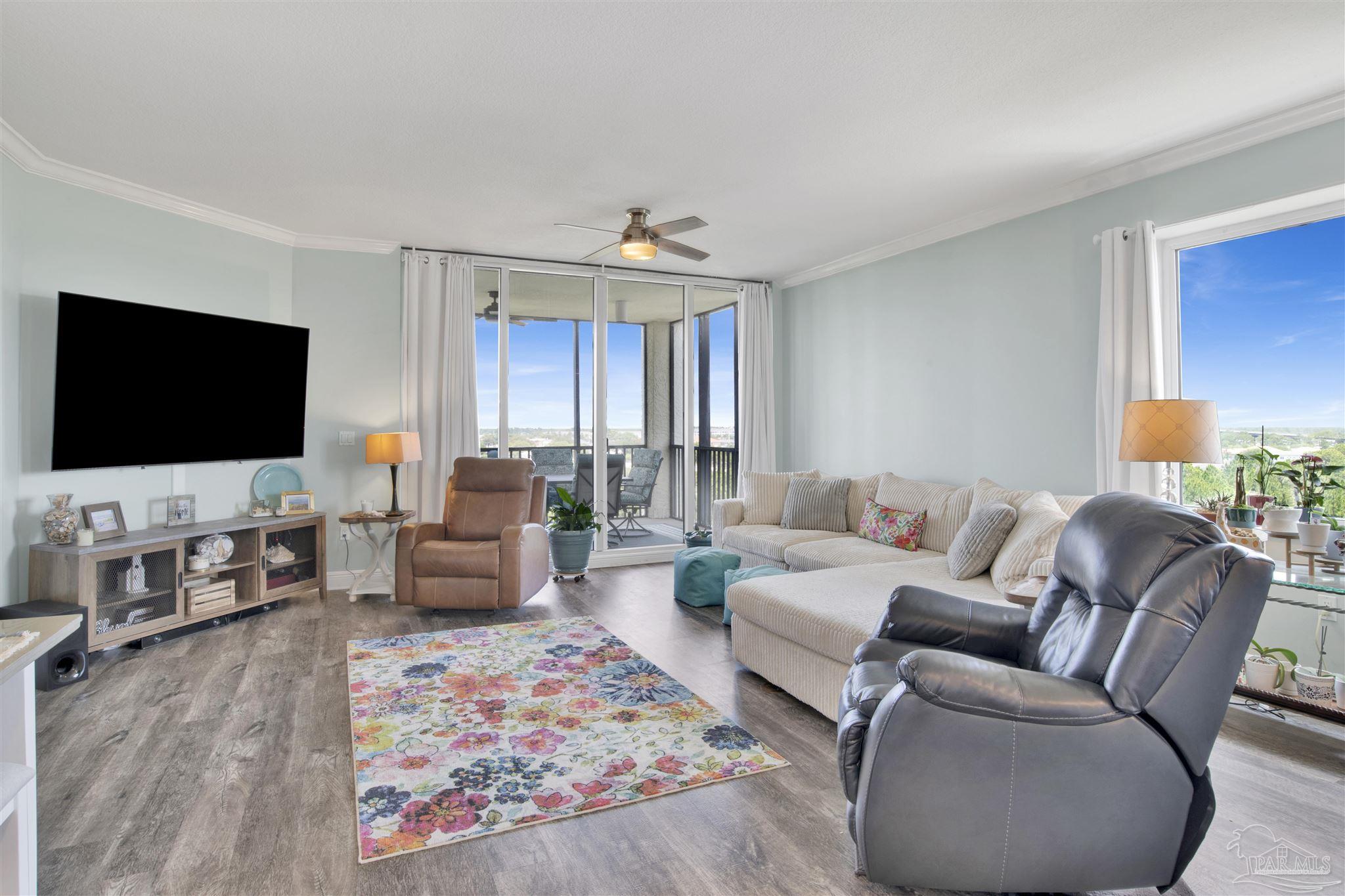 608 Lost Key Drive, Unit 705C Perdido Key, FL 32507 - Photo 14 of 51 a living room with furniture and a flat screen tv