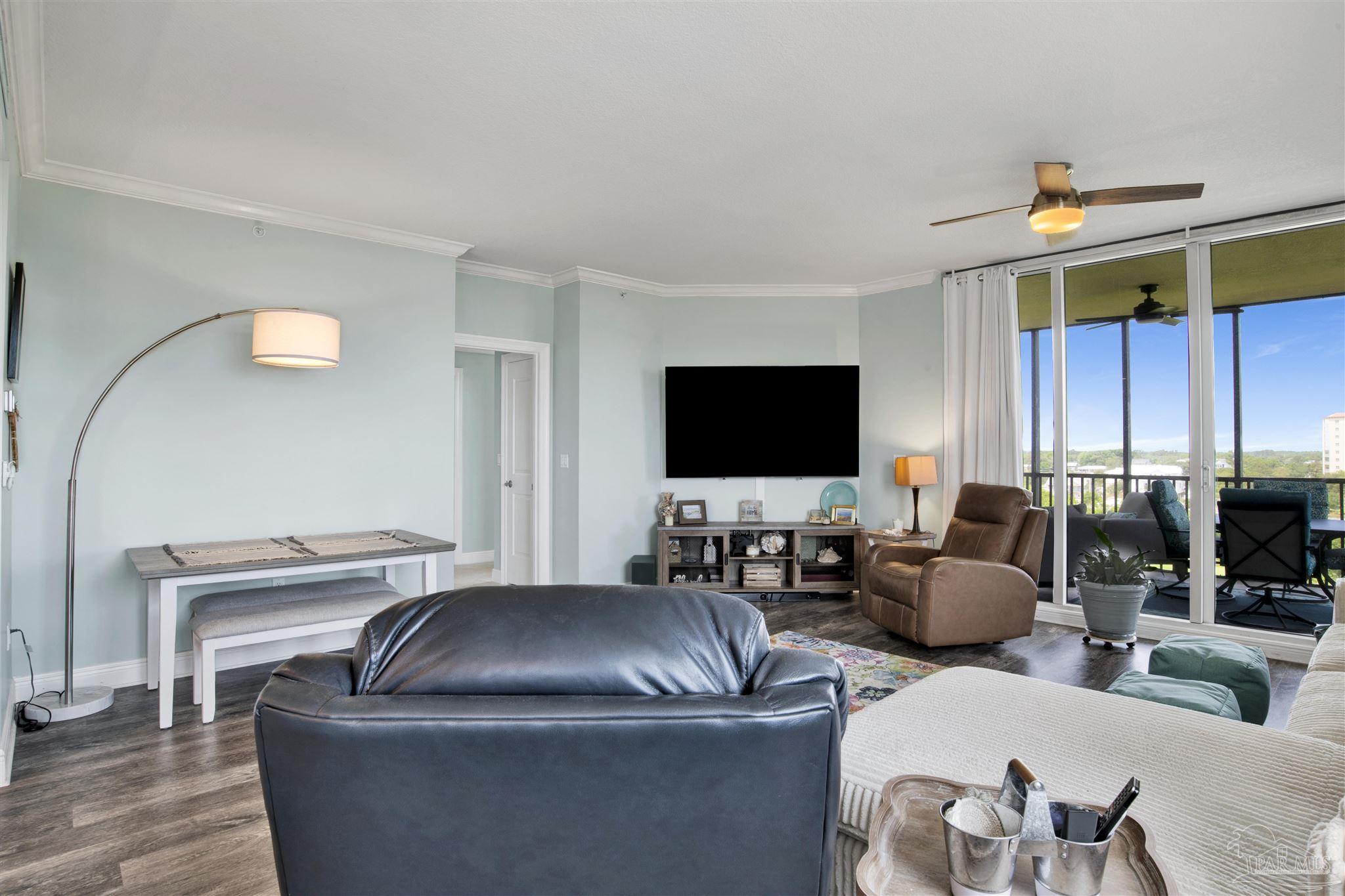 608 Lost Key Drive, Unit 705C Perdido Key, FL 32507 - Photo 15 of 51 a living room with furniture and a flat screen tv