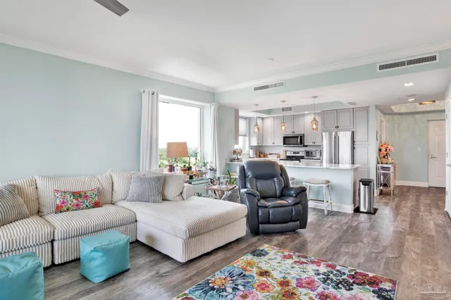 a living room with furniture and a couch