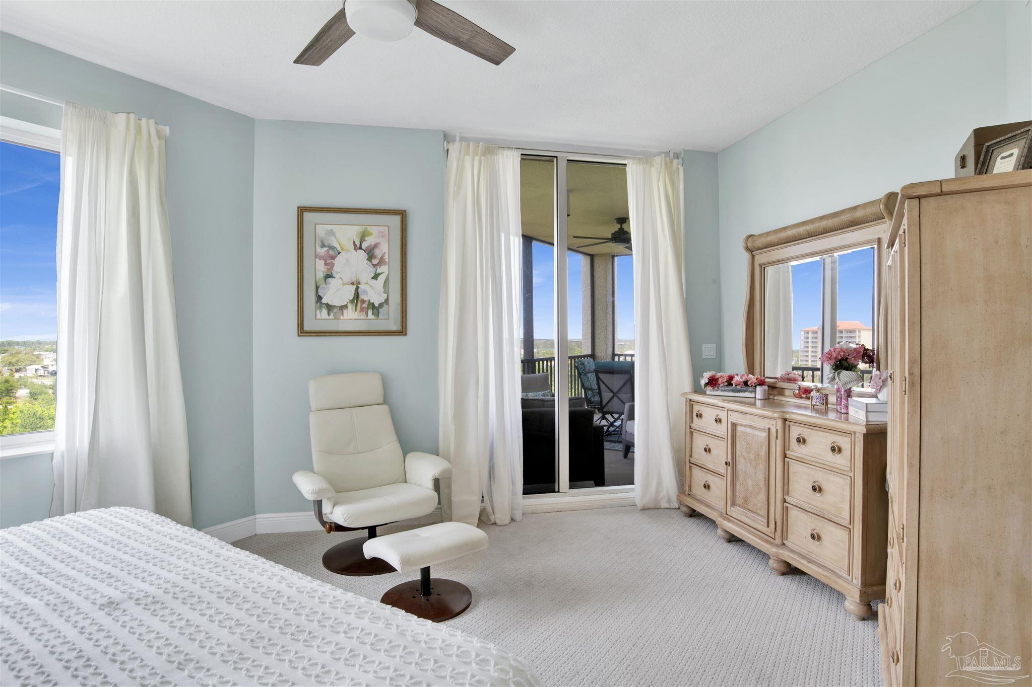 608 Lost Key Drive, Unit 705C Perdido Key, FL 32507 - Photo 20 of 51 a bedroom with furniture and a large window