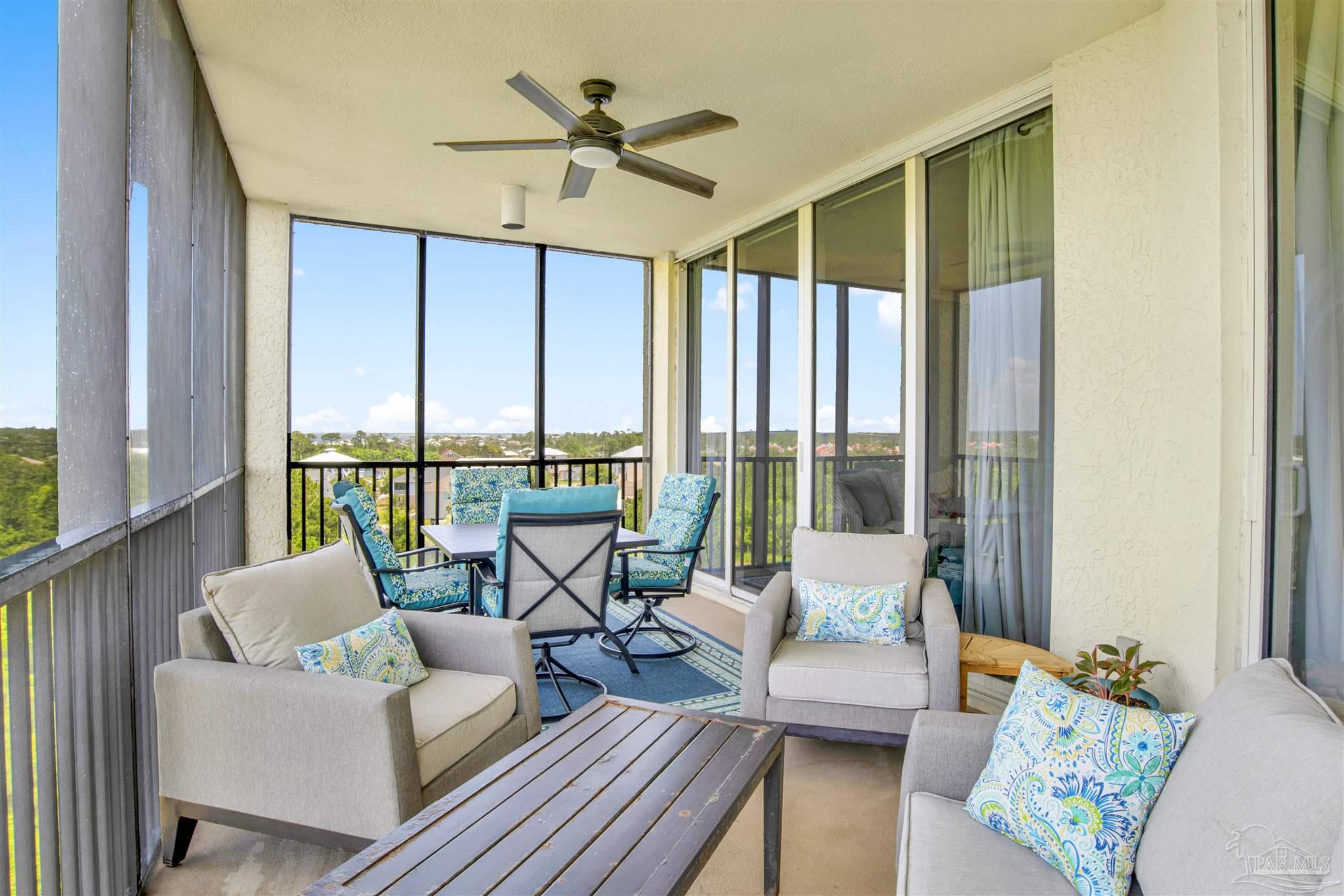 608 Lost Key Drive, Unit 705C Perdido Key, FL 32507 - Photo 3 of 51 a living room with furniture and a large window