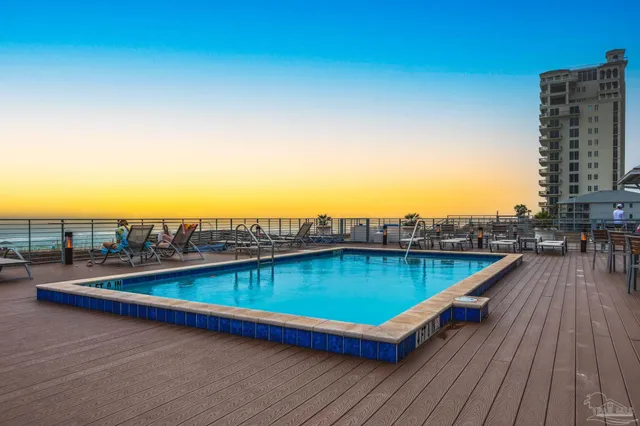 a view of a lake with sitting area