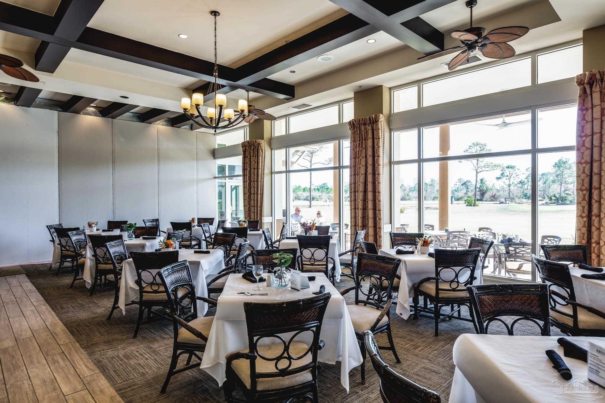 608 Lost Key Drive, Unit 705C Perdido Key, FL 32507 - Photo 40 of 51 a view of a dining room with furniture window and outside view