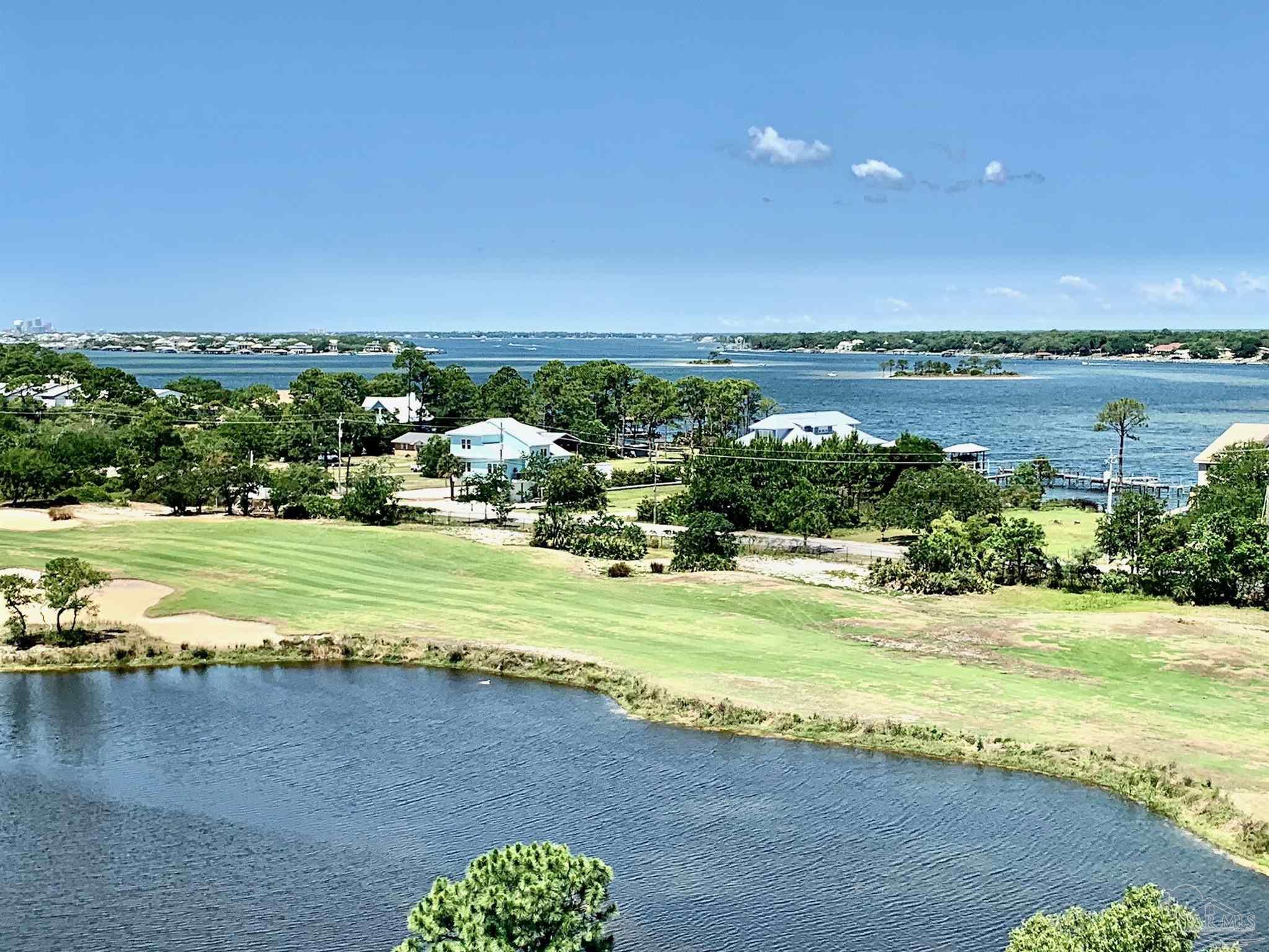 608 Lost Key Drive, Unit 705C Perdido Key, FL 32507 - Photo 46 of 51 a view of a city with an ocean beach