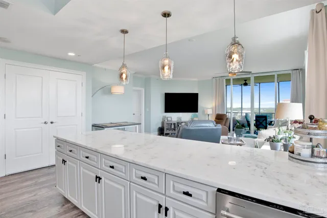 a kitchen with sink and window