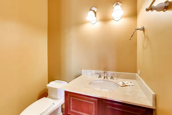 a bathroom with a sink and a toilet