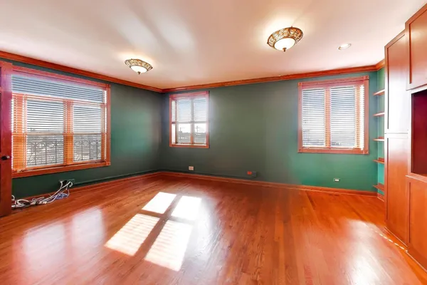a view of an empty room and window