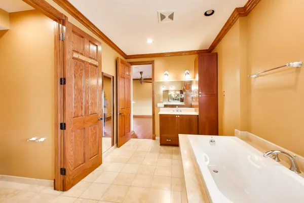 a bathroom with a bathtub and shower