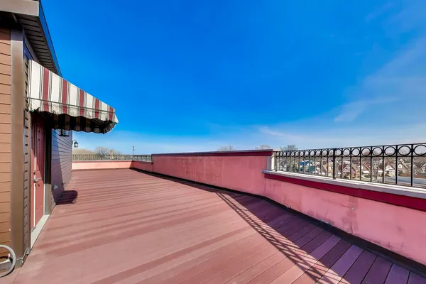 a view of a balcony with an outdoor space