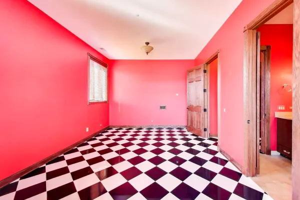 a large room with a black white walls