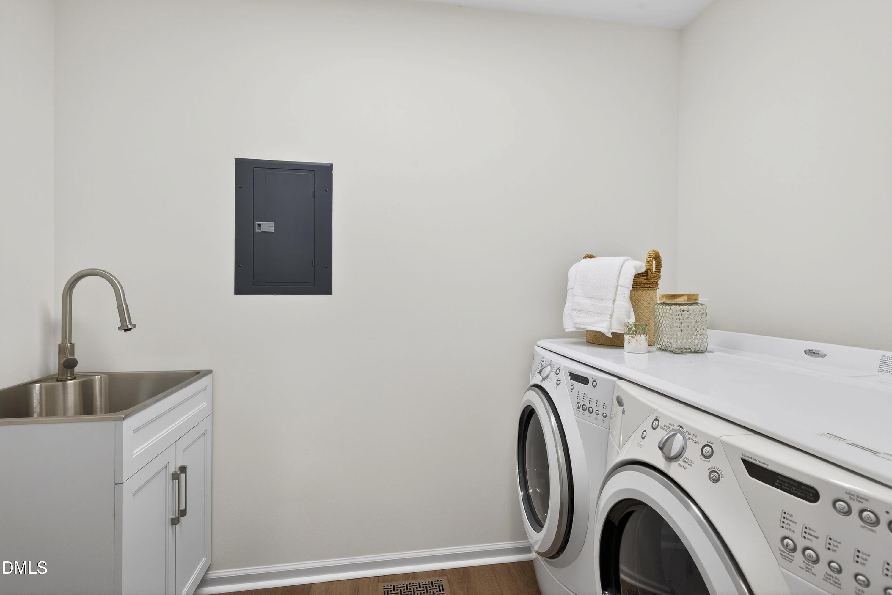 3304 Abney Place Raleigh, NC 27607 - Photo 23 of 55 New sink added plus washer and dryer convey to new owners