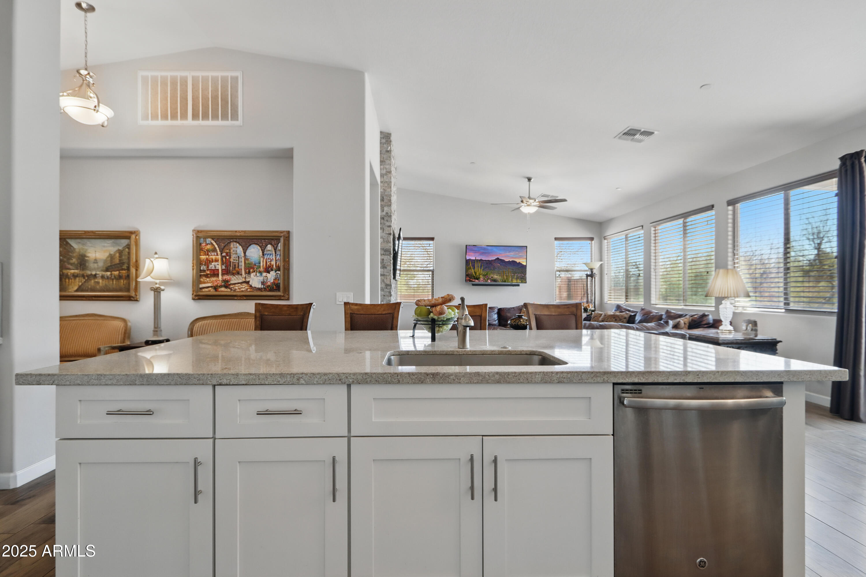 19023 East Buckskin Drive Rio Verde, AZ 85263 - Photo 12 of 58 a kitchen with counter top space cabinets and stainless steel appliances