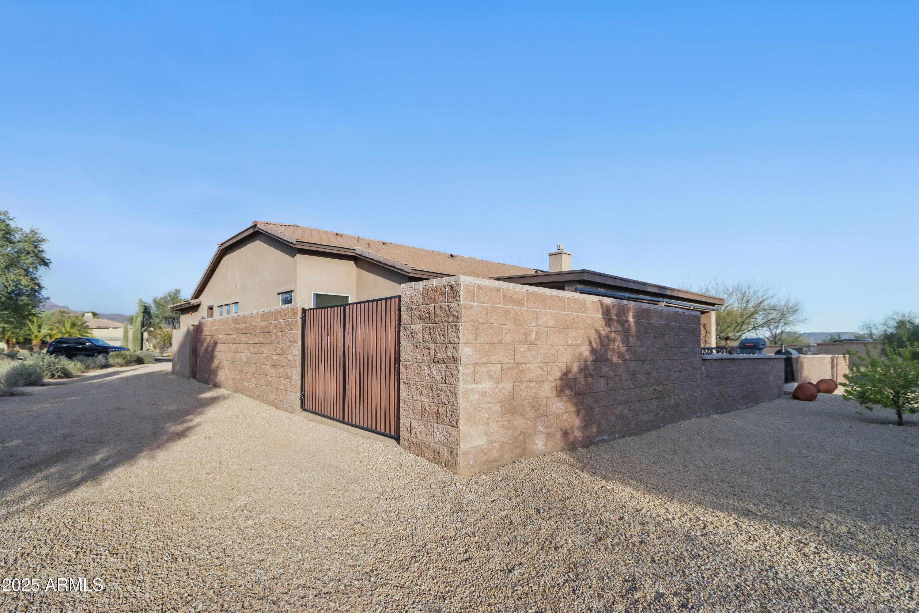 19023 East Buckskin Drive Rio Verde, AZ 85263 - Photo 25 of 31 a view of a house with a yard