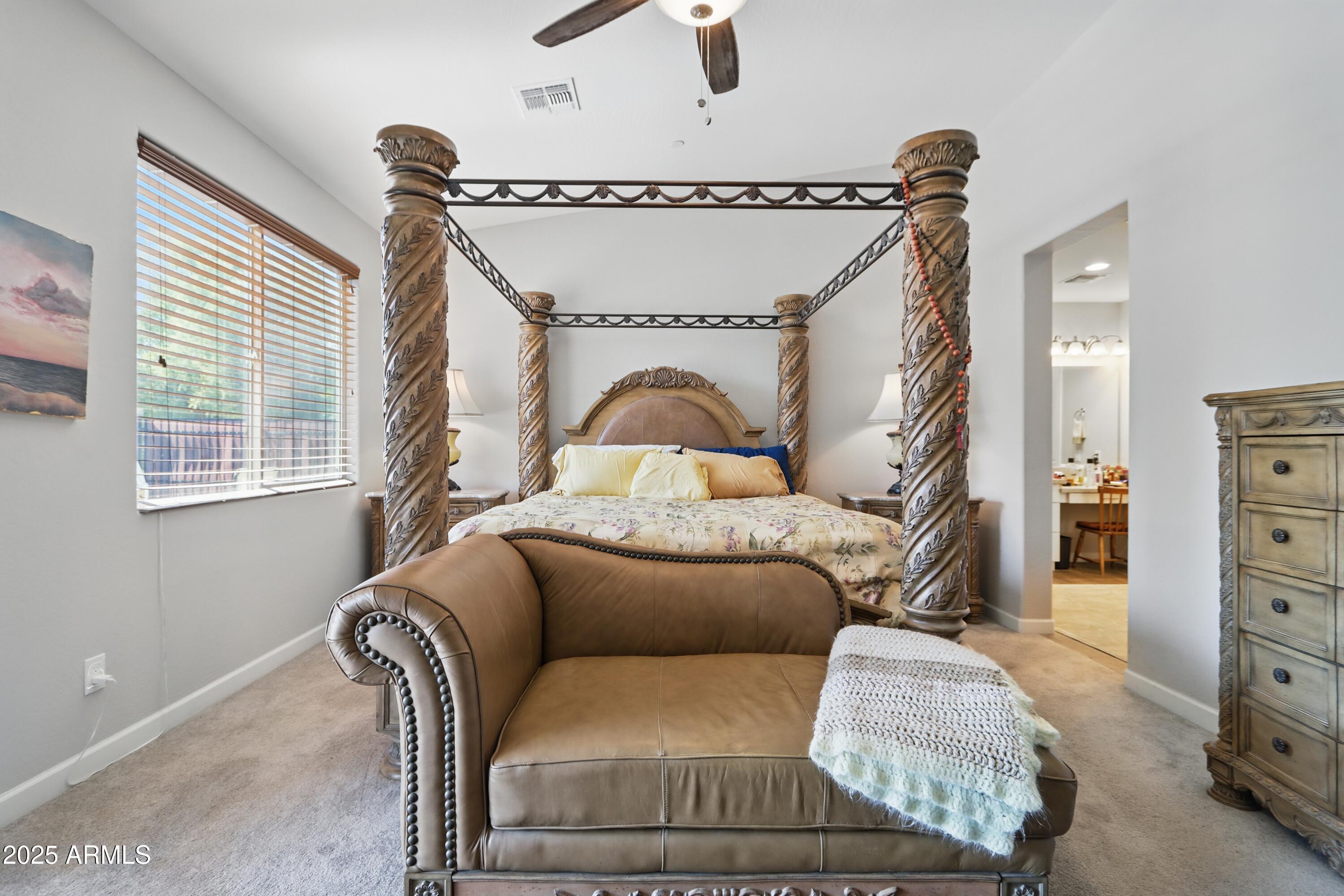 19023 East Buckskin Drive Rio Verde, AZ 85263 - Photo 25 of 58 a bedroom with a bed and a dresser
