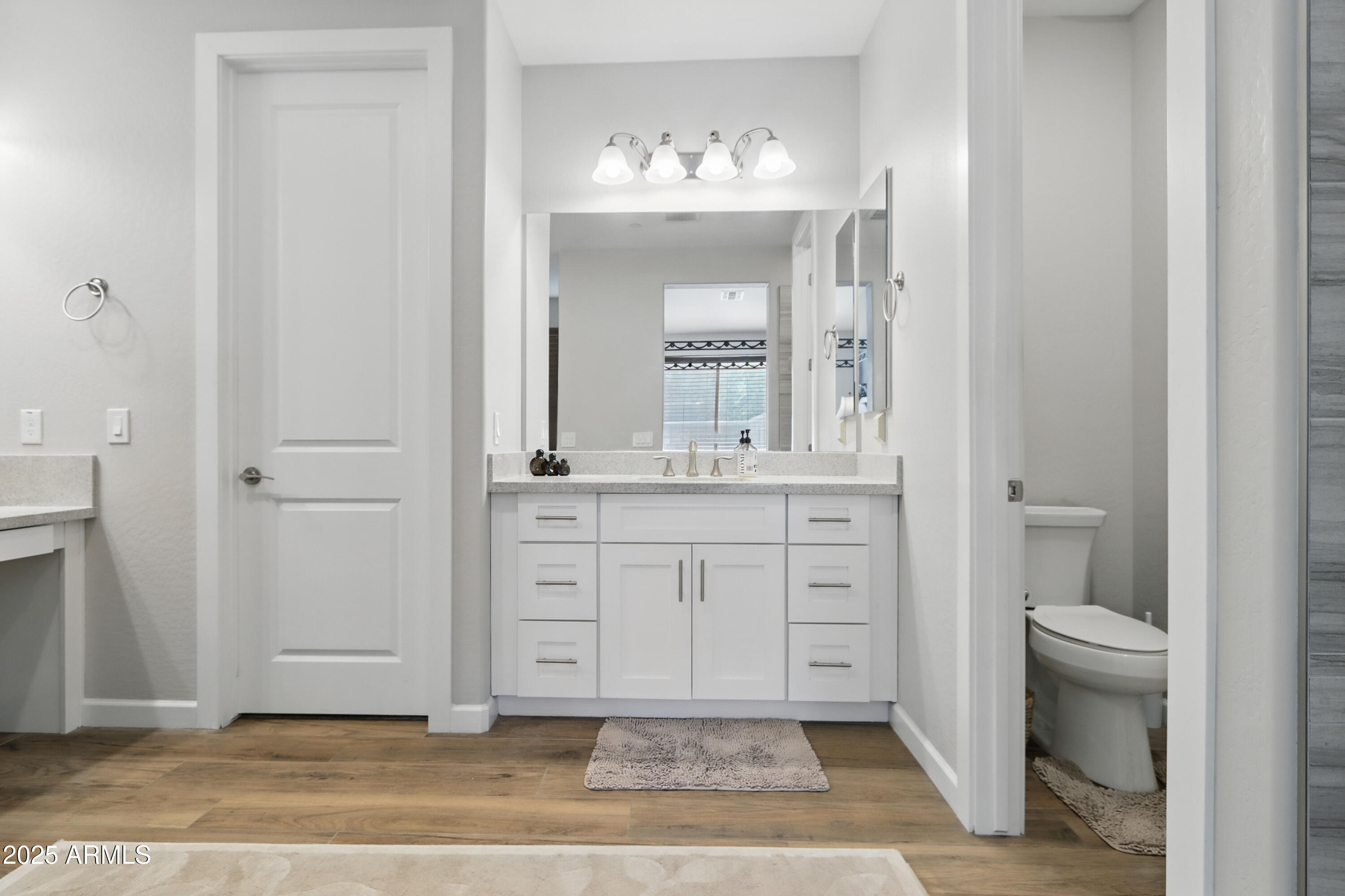 19023 East Buckskin Drive Rio Verde, AZ 85263 - Photo 26 of 58 a bathroom with a sink a toilet and a mirror