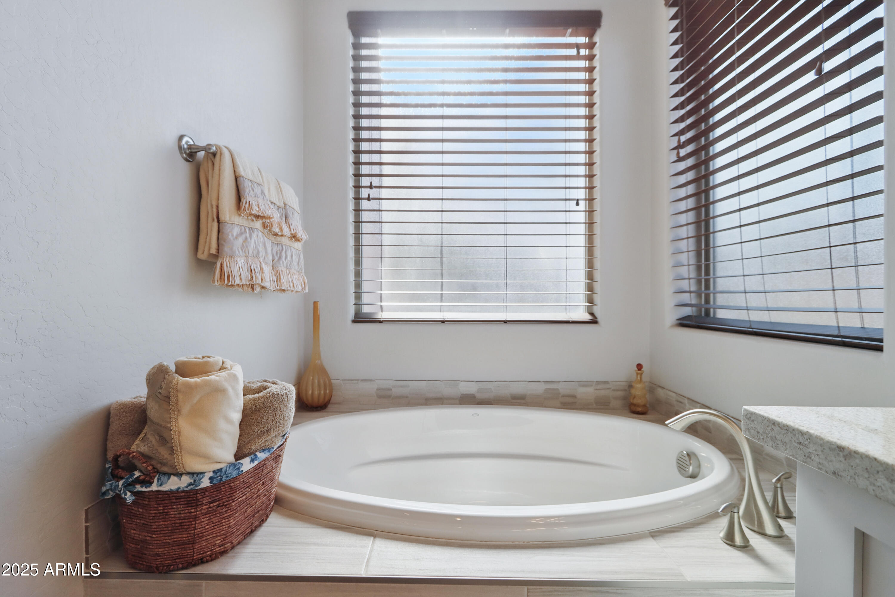 19023 East Buckskin Drive Rio Verde, AZ 85263 - Photo 30 of 58 a bathroom with a tub and a window