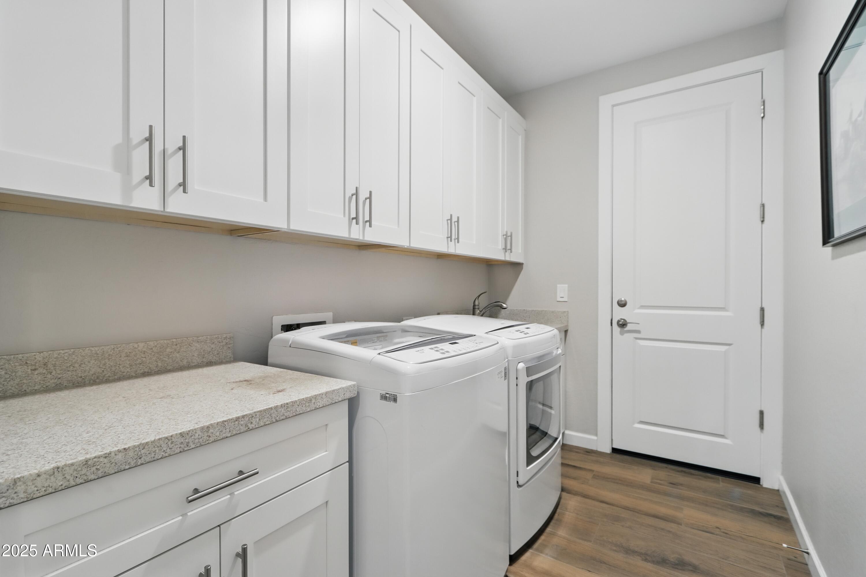19023 East Buckskin Drive Rio Verde, AZ 85263 - Photo 35 of 58 a utility room with dryer and washer