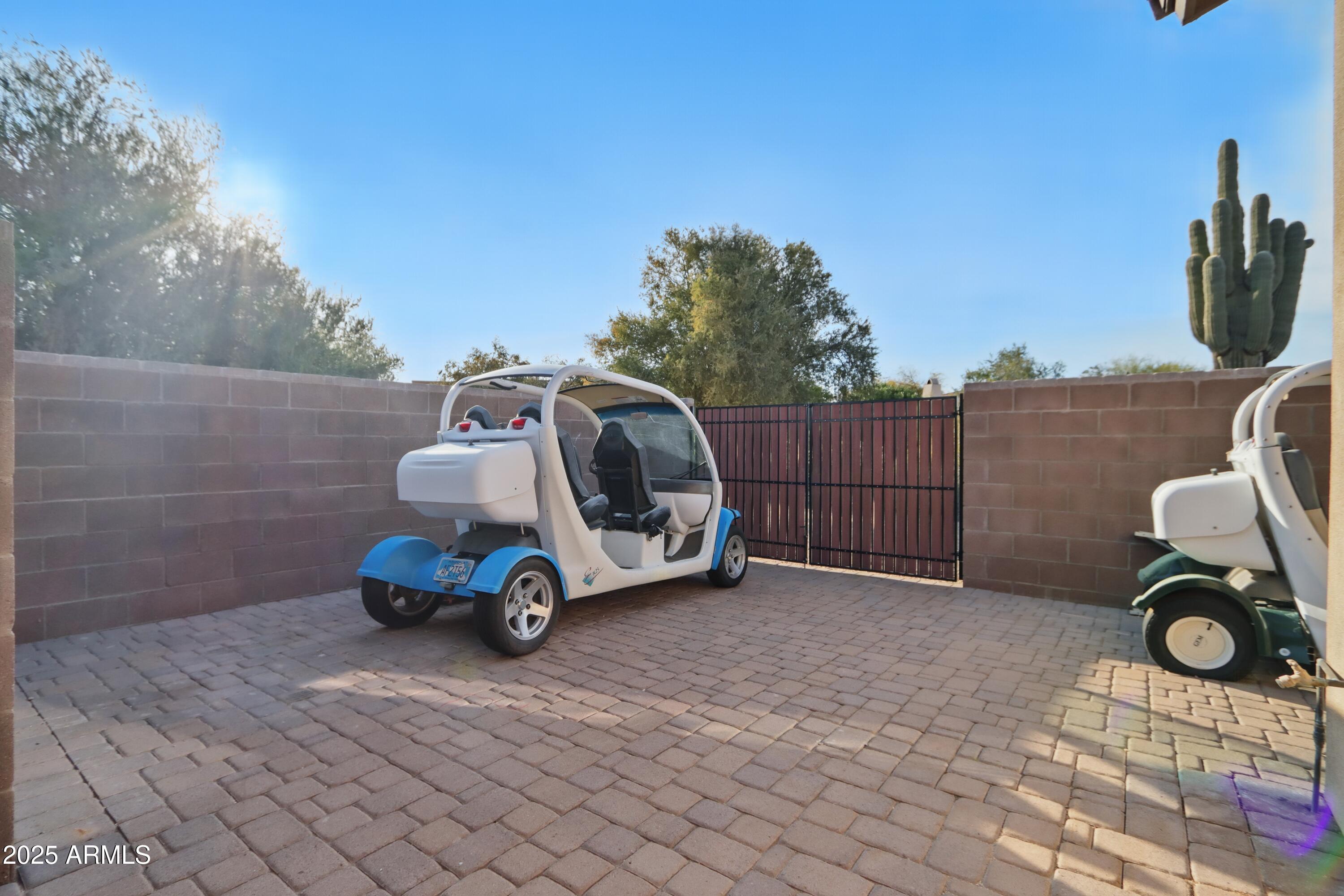 19023 East Buckskin Drive Rio Verde, AZ 85263 - Photo 42 of 58 a car parked on the side of a road