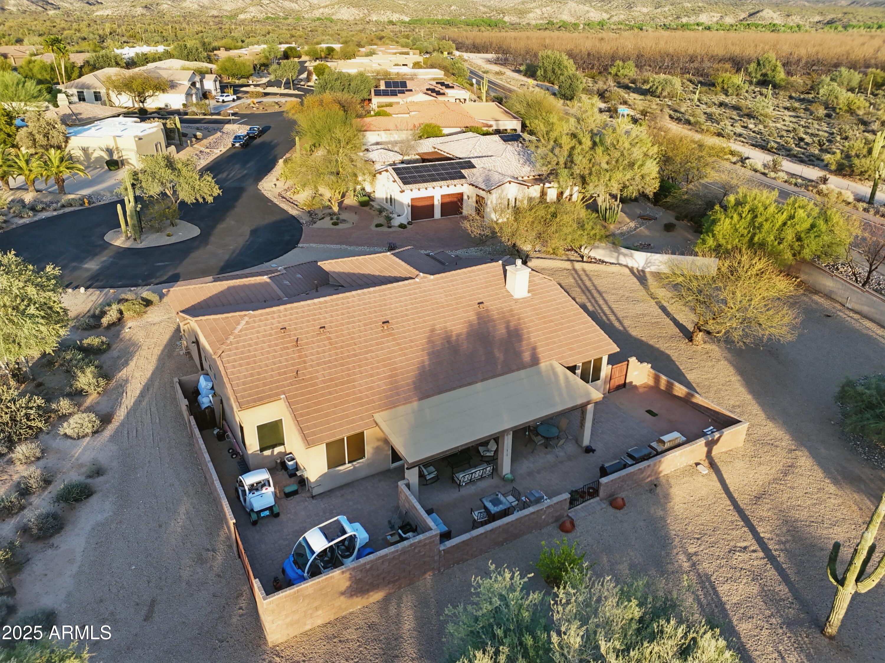 19023 East Buckskin Drive Rio Verde, AZ 85263 - Photo 44 of 58 an aerial view of residential houses with outdoor space