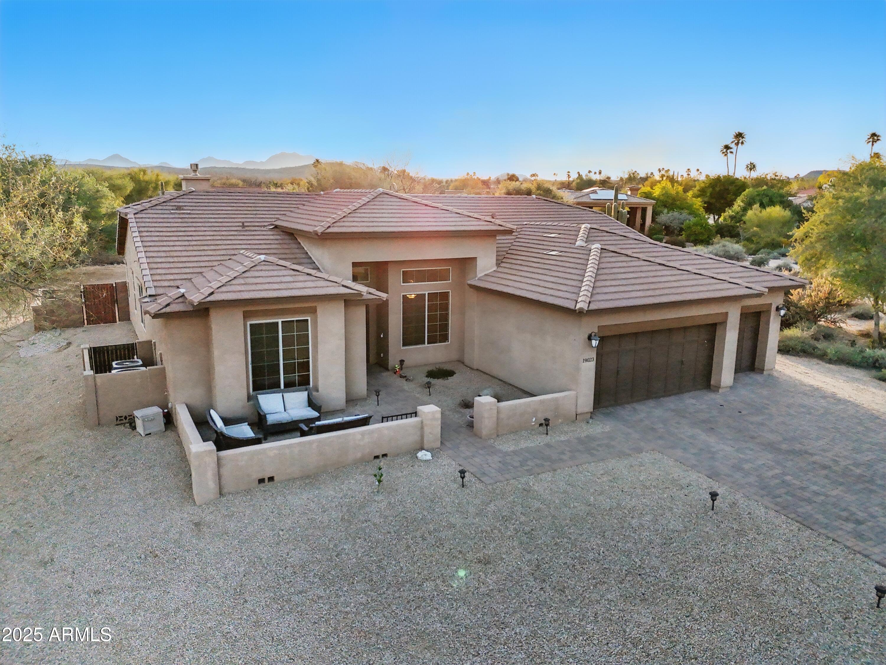 19023 East Buckskin Drive Rio Verde, AZ 85263 - Photo 50 of 58 a view of a house with a outdoor space