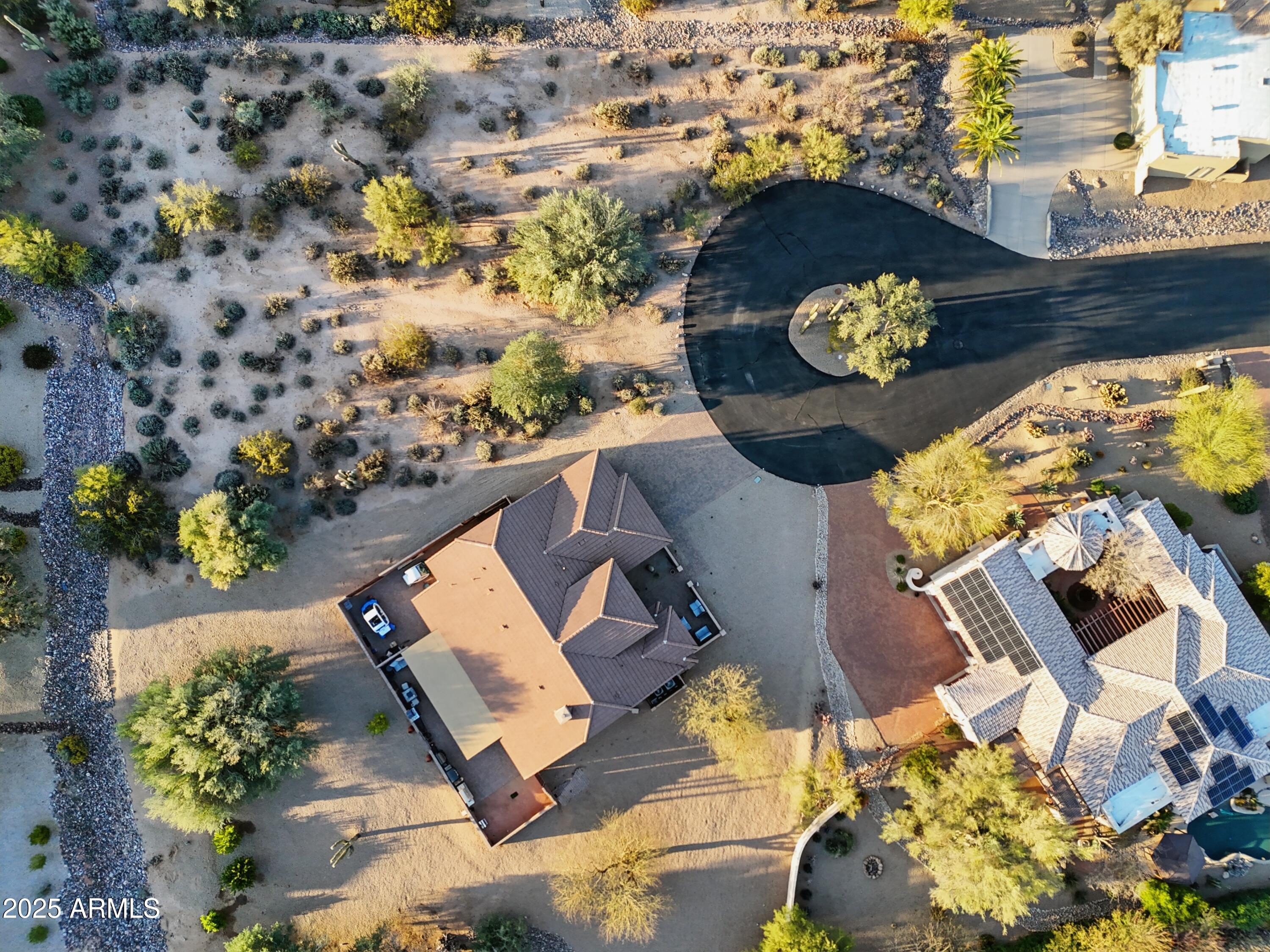 19023 East Buckskin Drive Rio Verde, AZ 85263 - Photo 55 of 58 an aerial view of a house with a yard