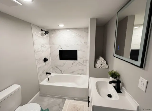 a bathroom with a sink and a bathtub