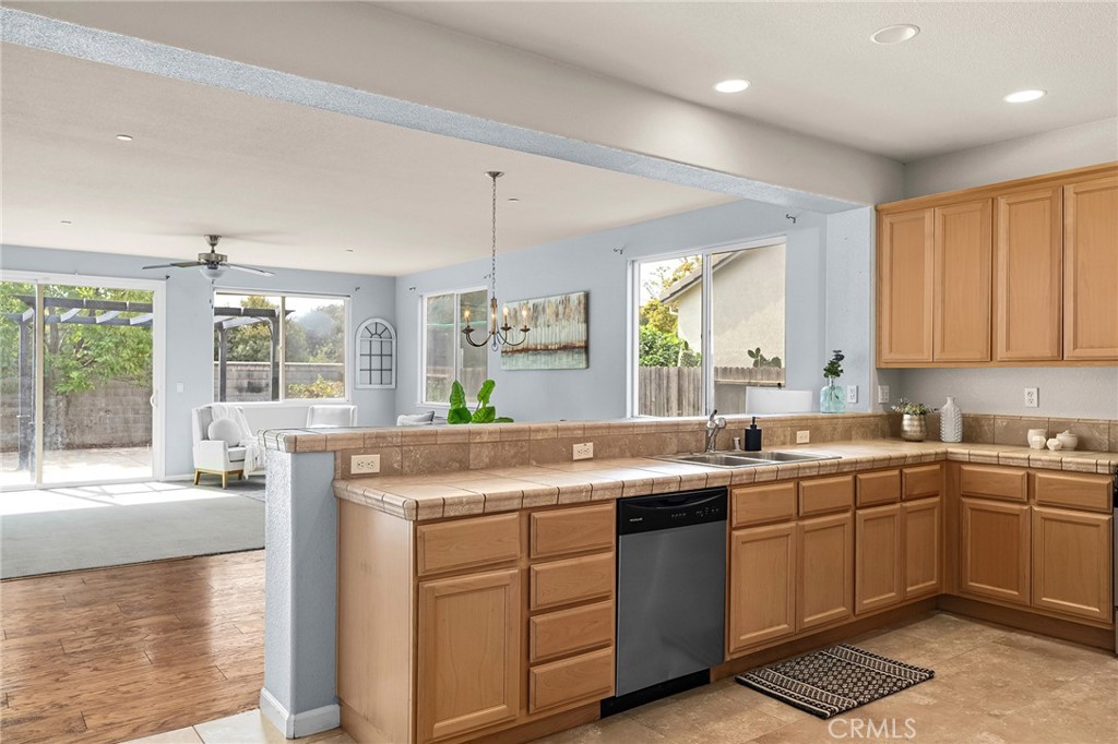 2135 Jacob Street Gridley, CA 95948 - Photo 13 of 50 a kitchen with a sink stove and cabinets