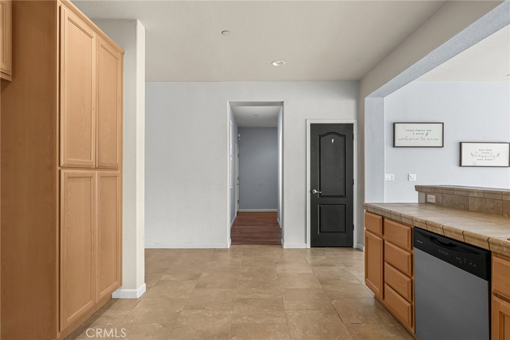 2135 Jacob Street Gridley, CA 95948 - Photo 16 of 50 a kitchen with a refrigerator and a sink
