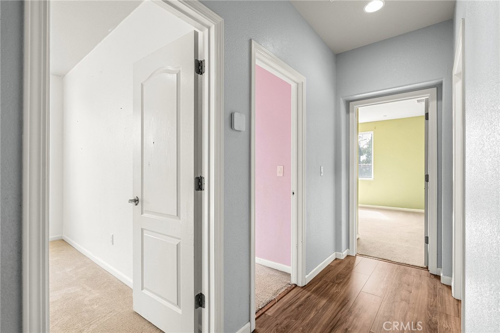 2135 Jacob Street Gridley, CA 95948 - Photo 22 of 50 a view of a hallway with wooden floor