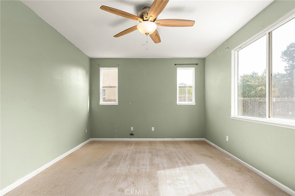 2135 Jacob Street Gridley, CA 95948 - Photo 26 of 50 an empty room with windows and fan
