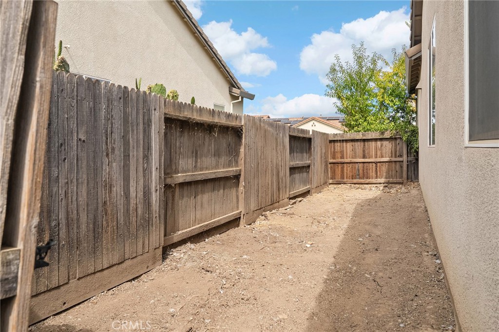 2135 Jacob Street Gridley, CA 95948 - Photo 44 of 50 a view of a house with a wooden fence