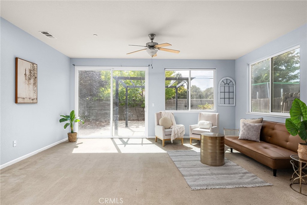 2135 Jacob Street Gridley, CA 95948 - Photo 10 of 50 a living room with furniture and a chandelier